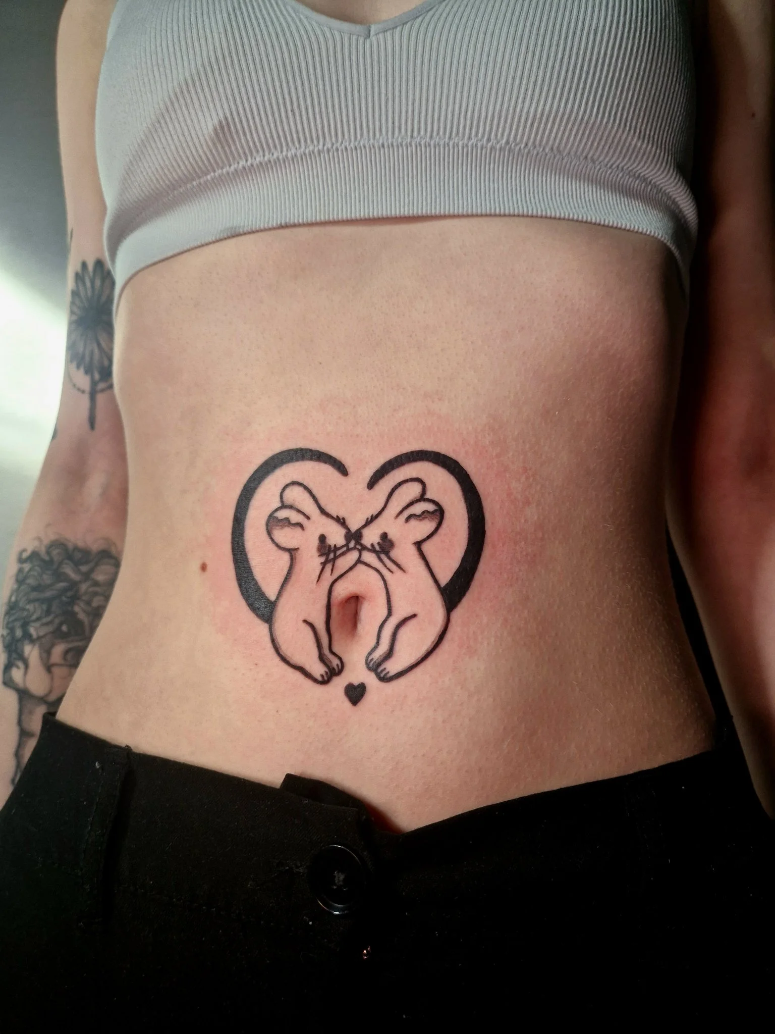 Illustrative two rabbits kissing in heart shape on stomach