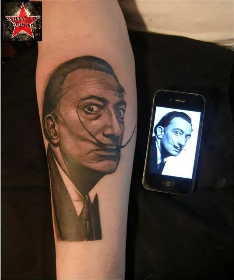 Black and grey realism portrait tattoo on forearm