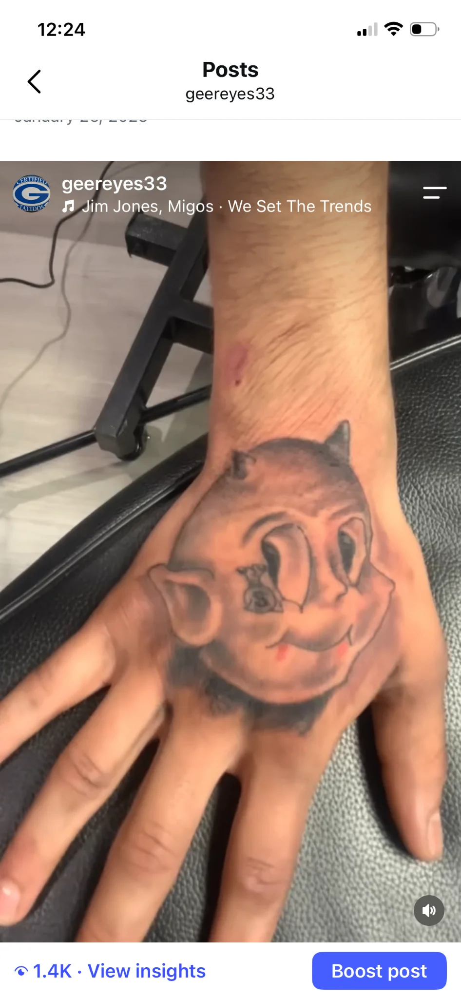 Black and grey Chicano devil face tattoo on hand