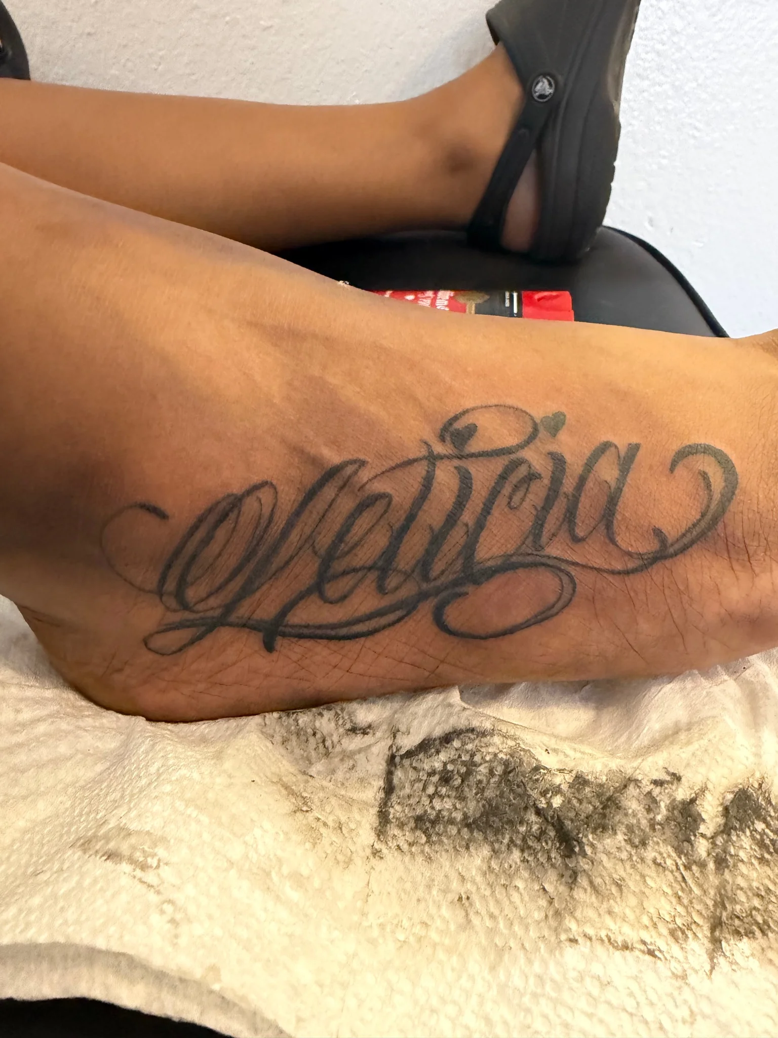 Calligraphy tattoo by Ronnie Gunter