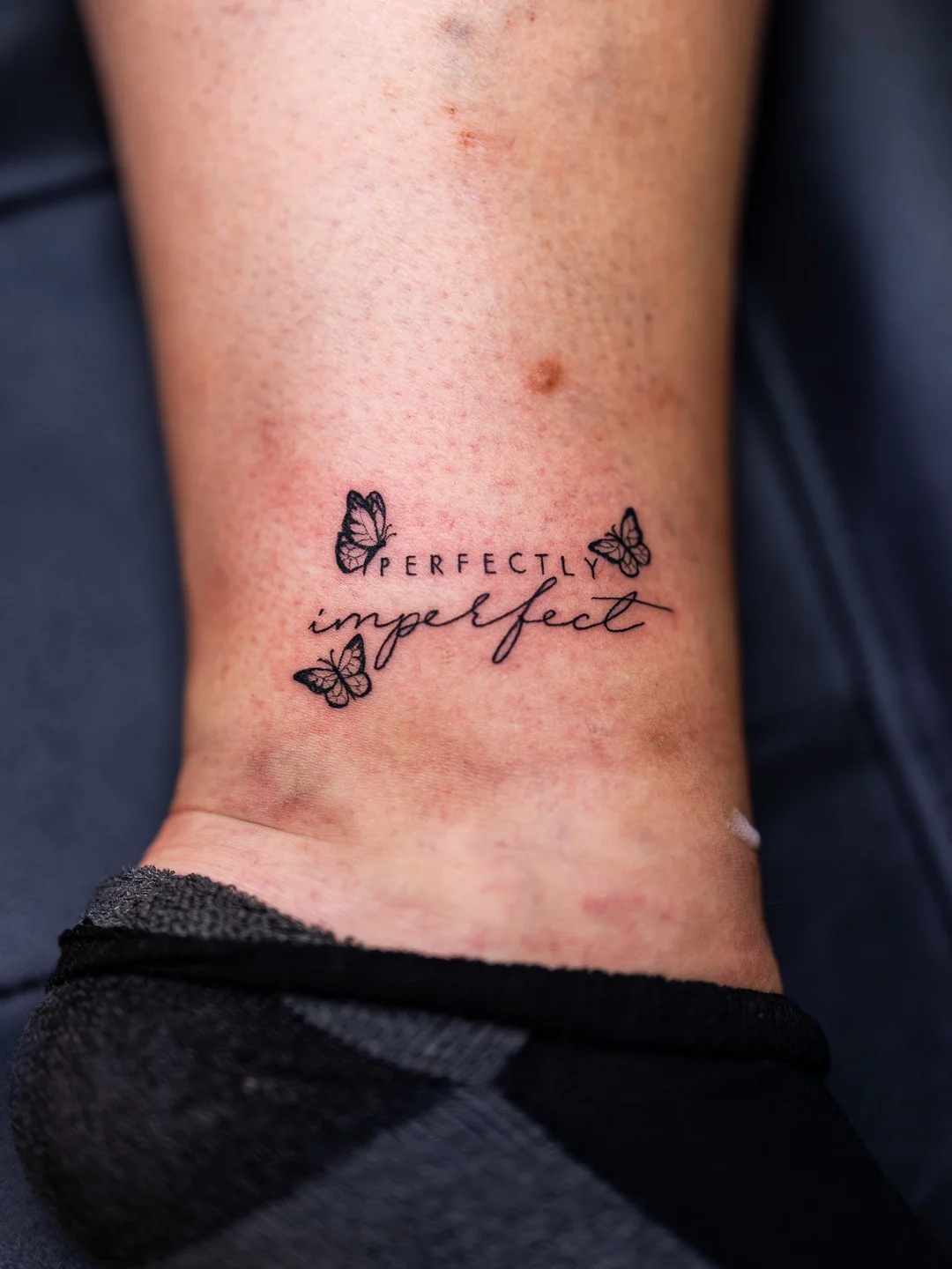 Script tattoo by Rely