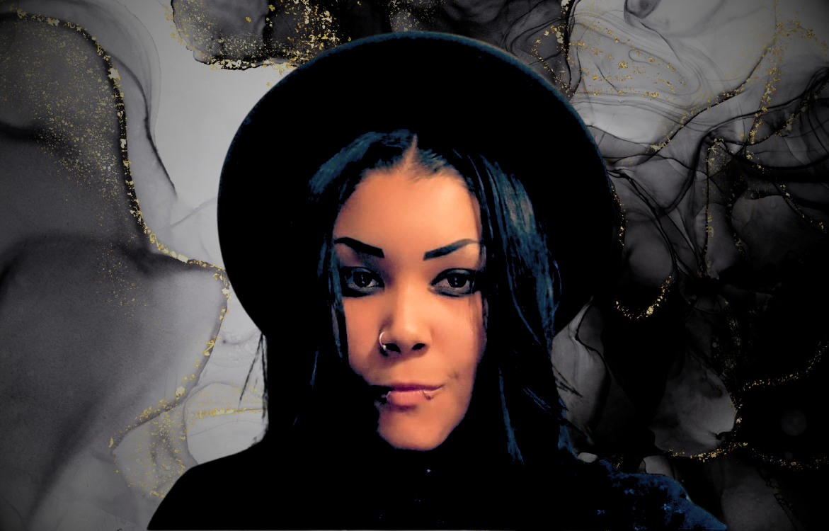 Portrait of woman wearing black hat with artistic styling