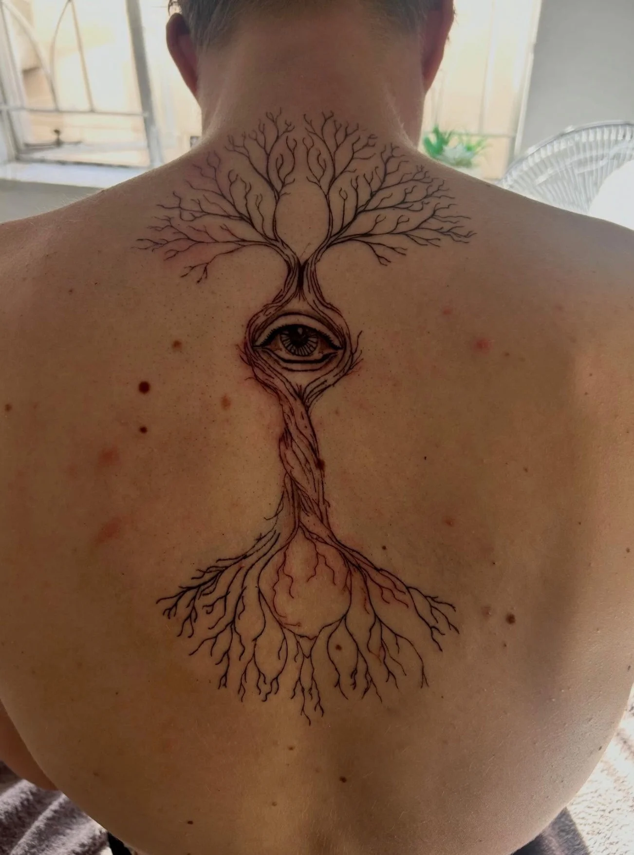 Tattoo by Caitlin Storrier