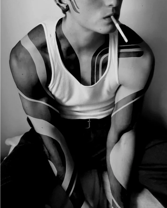 Black and grey realism portrait with headphones on chest piece