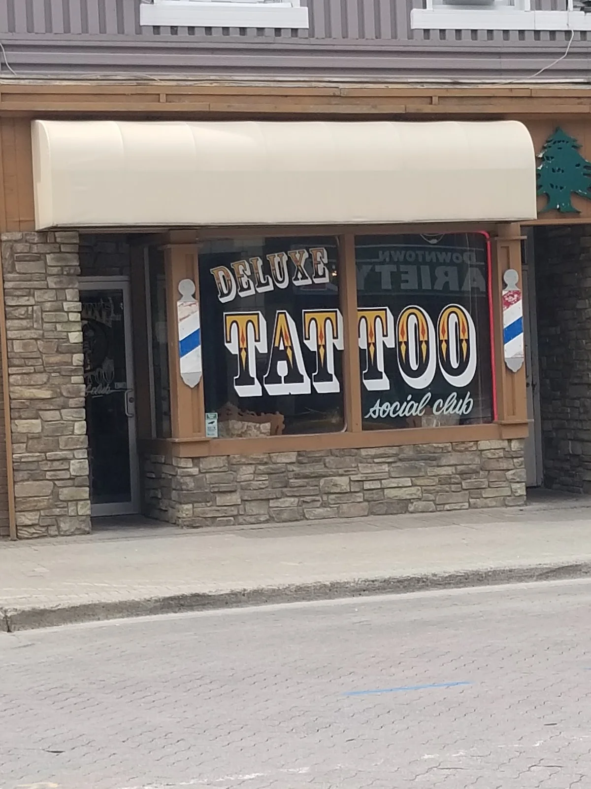 Deluxe Tattoo Social Club tattoo shop in North Bay, ON