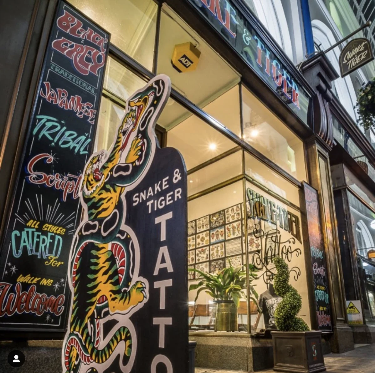Snake And Tiger Tattoo photo