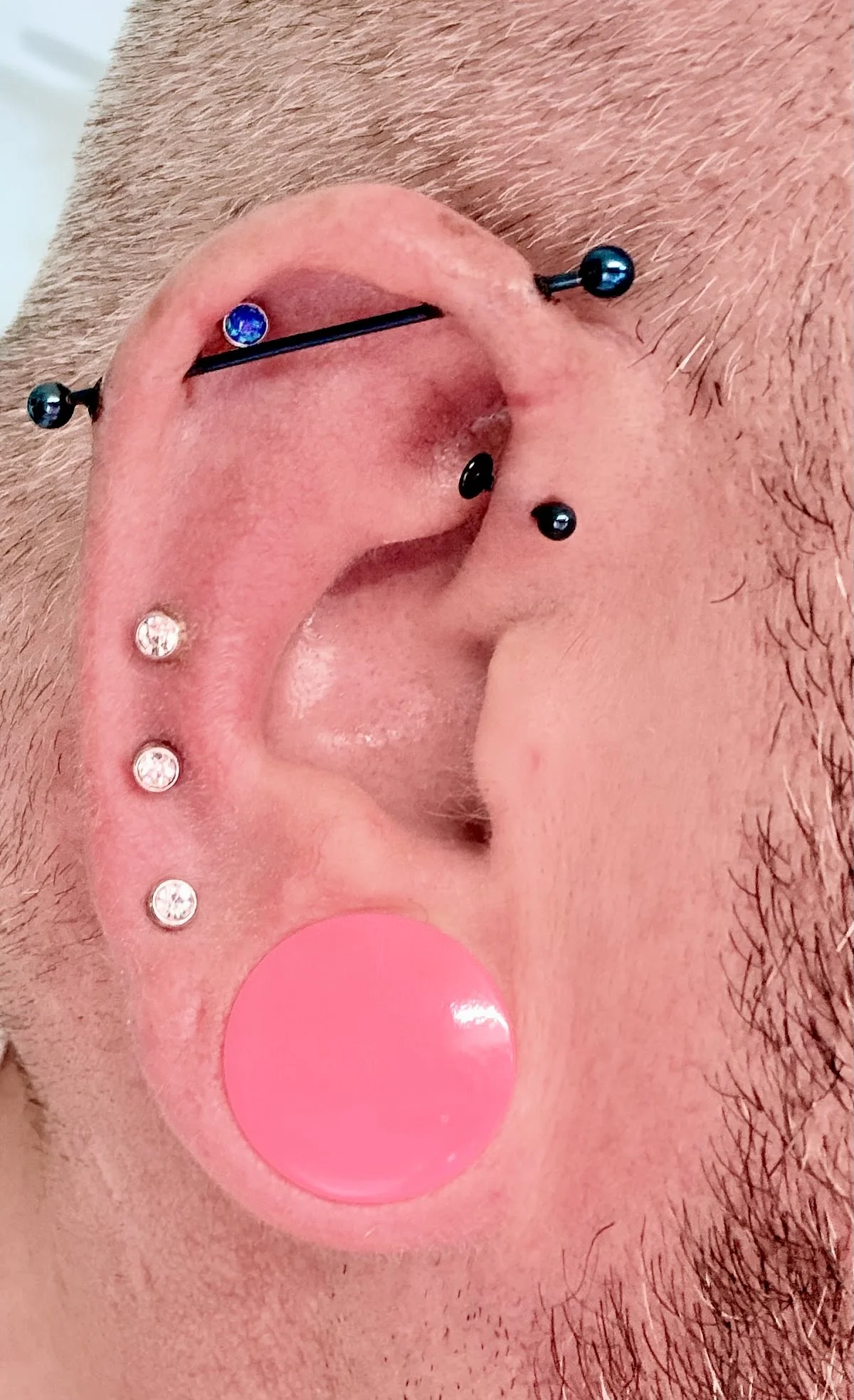 Nixie piercing and tattoo removal photo