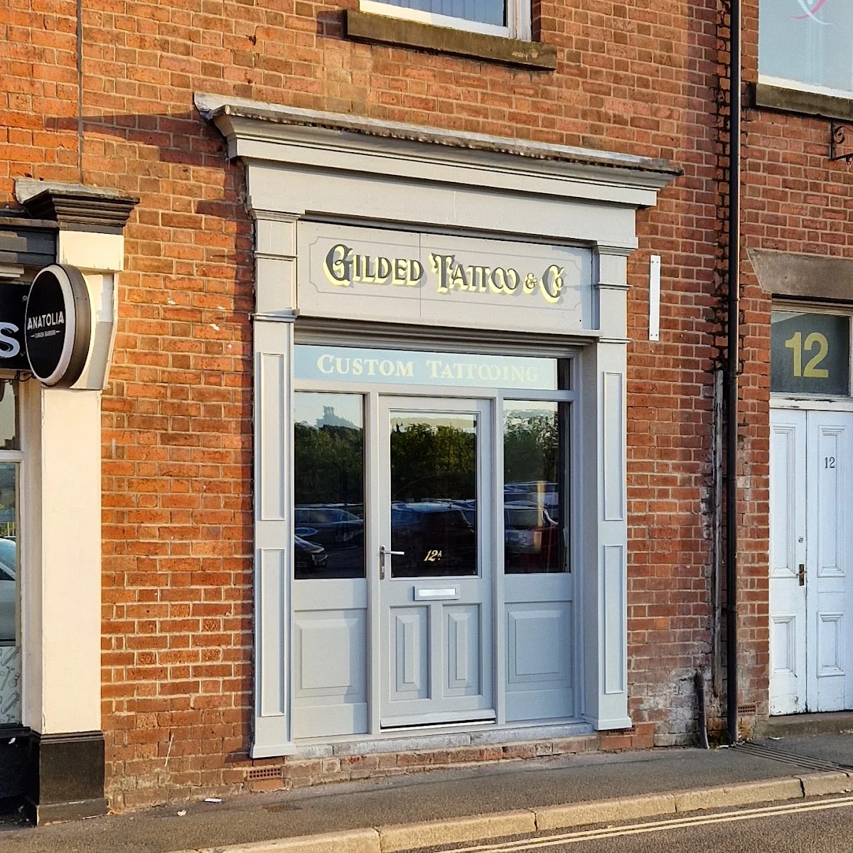 Gilded Tattoo & Co photo