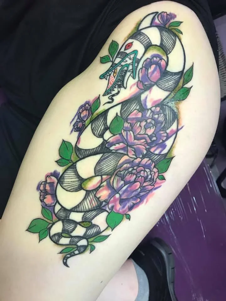 Synthia Roy tattoo and body piercing photo