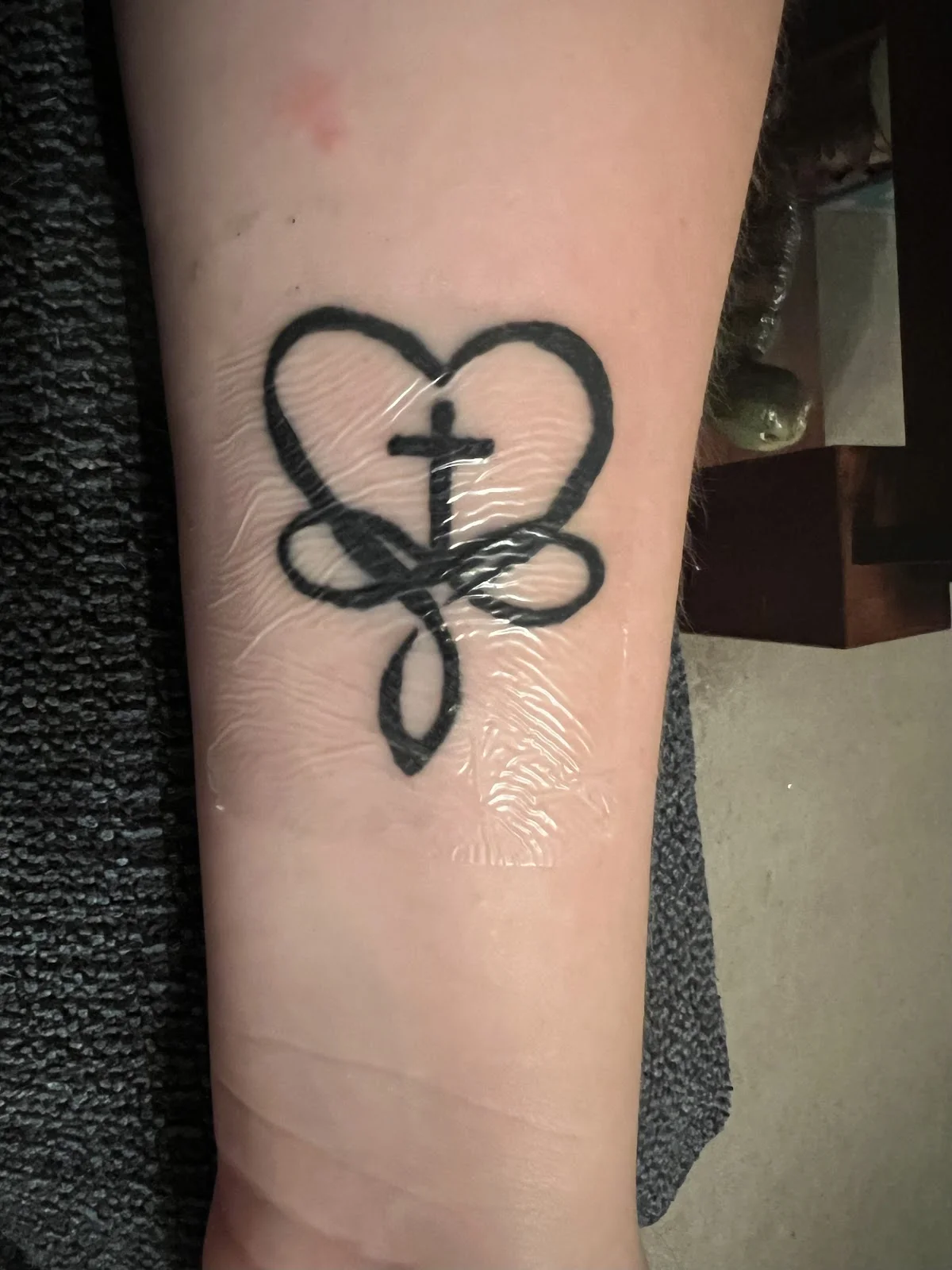 Inkology Tattoos & Piercings Four Seasons photo