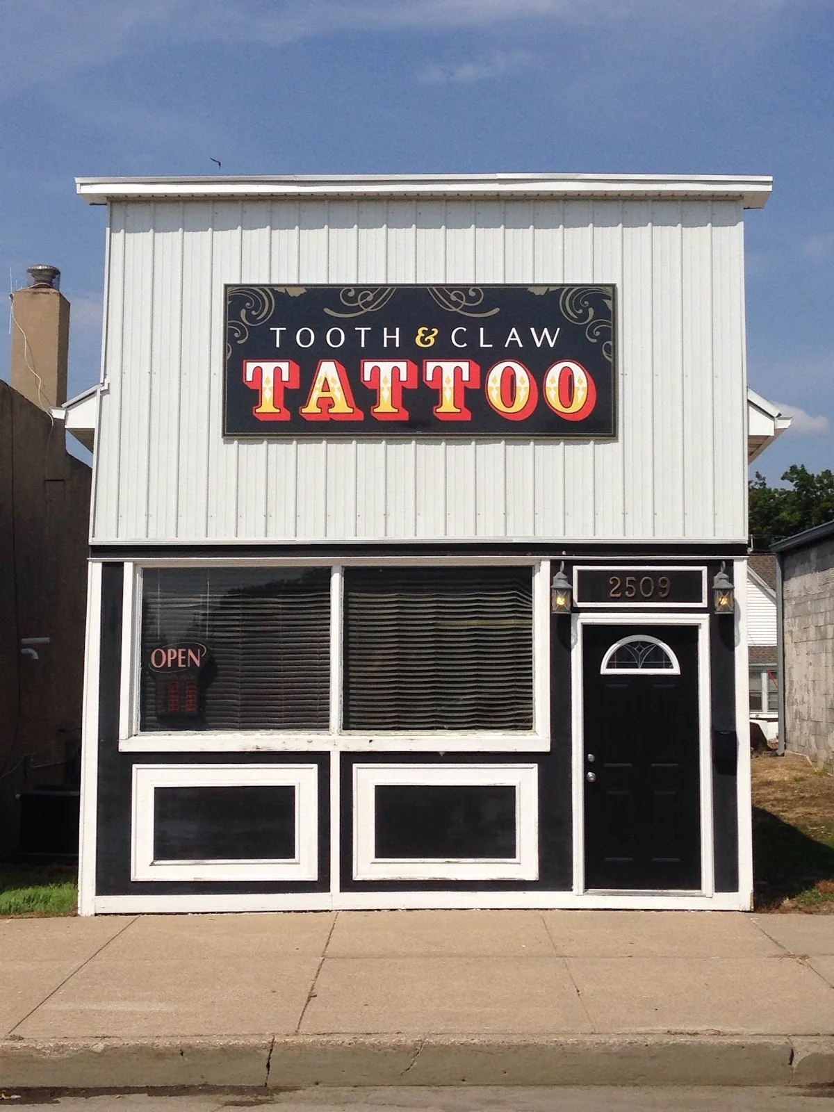 Tooth And Claw Tattoo photo