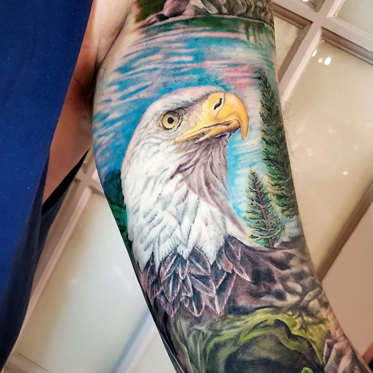 Alex Hunter at North Main Tattoo Studio tattoo shop in Livonia, MI