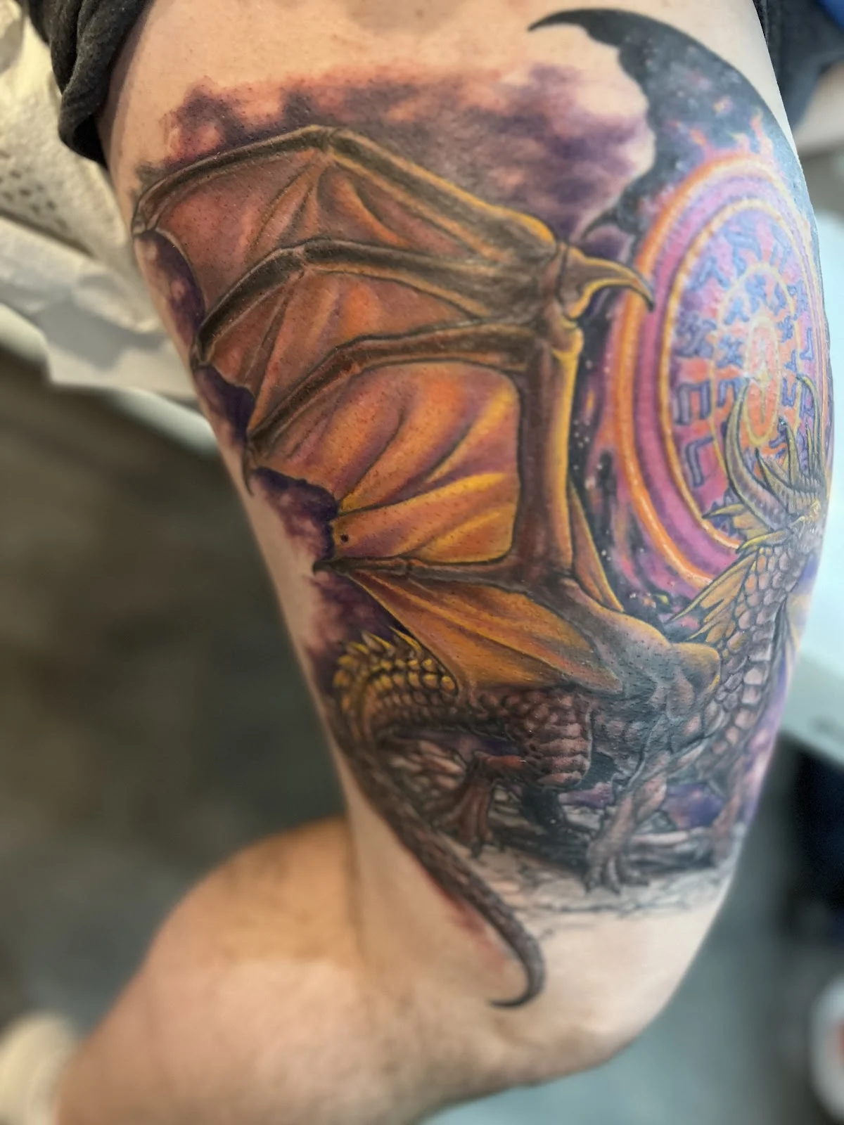 Feather and fang tattoo art studio photo