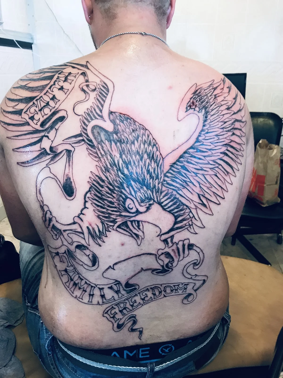 Magoos tattoos and body piercing photo